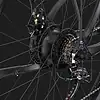 Close-up of electric bike rear hub motor and gears