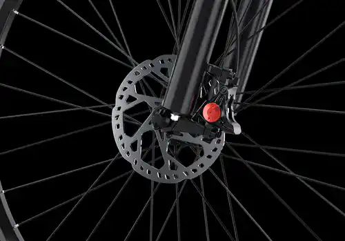 Close-up of bicycle disc brake and front wheel